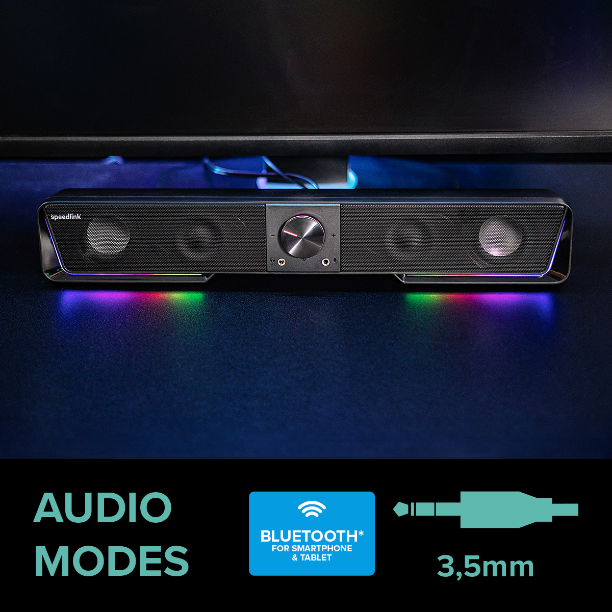 Moderne Speedlink Soundbar mit LED-RGB-Beleuchtung, Bluetooth und 3,5mm Klinkenanschluss, auf einem Schreibtisch vor einem Monitor platziert