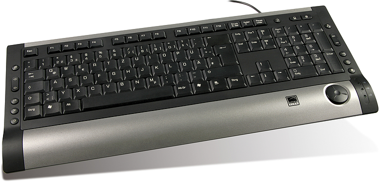 Schwarze Computer-Tastatur mit silberner Handballenauflage, integriertem Touchpad und zusätzlichen Funktionstasten