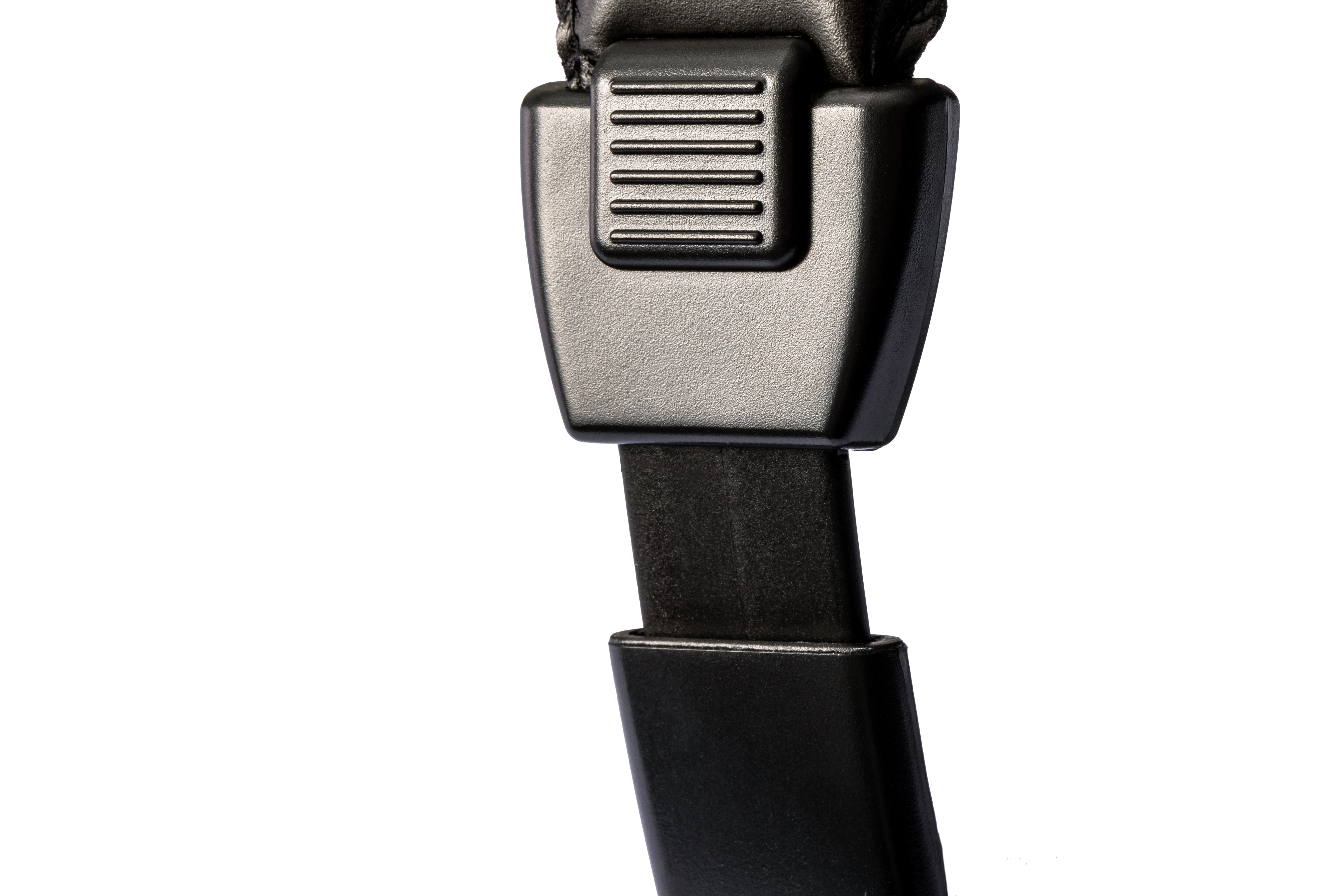 Detailaufnahme eines schwarzen Sicherheitsgurt-Schlosses aus Kunststoff