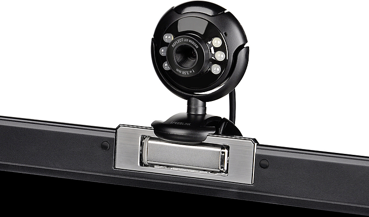 Schwarze USB-Webcam mit LED-Lichtern und Halterung, montiert auf einem Computermonitor
